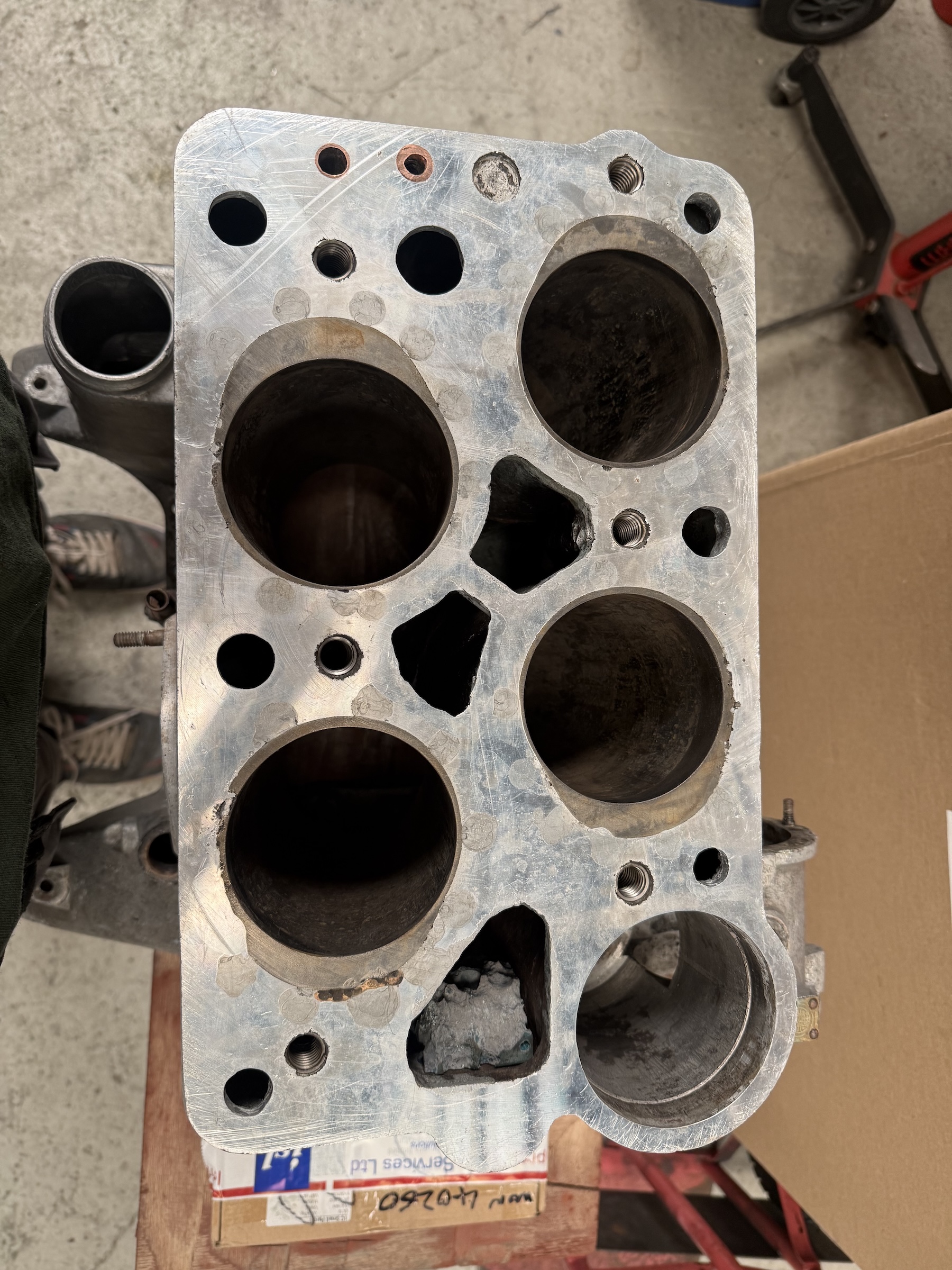 Alfa Romeo engine block showing liner bore damage before cold spray repair