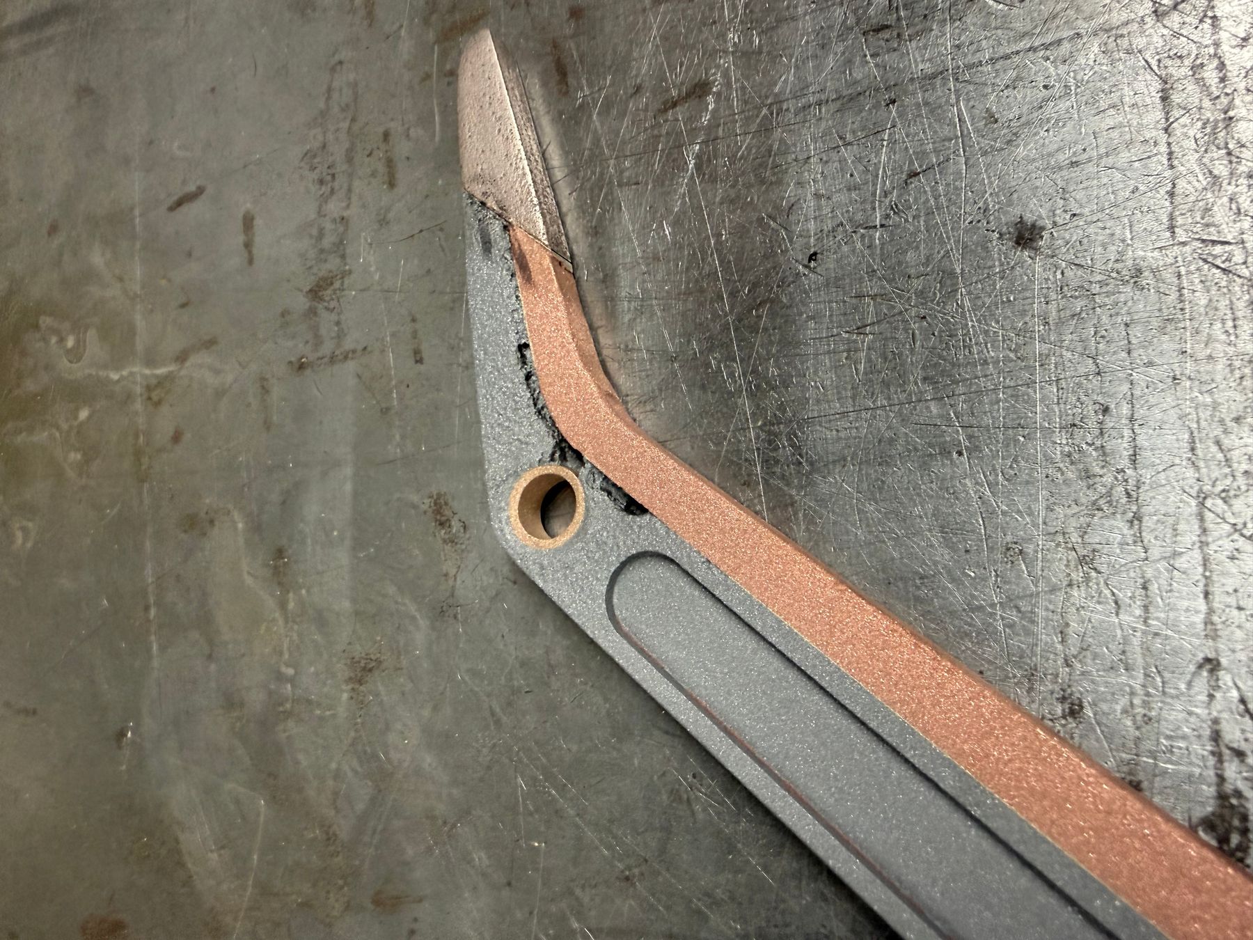 High voltage transfer arm being prepared for copper cold spray coating